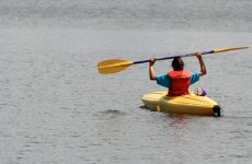 Young Girl in Yellow Kayak